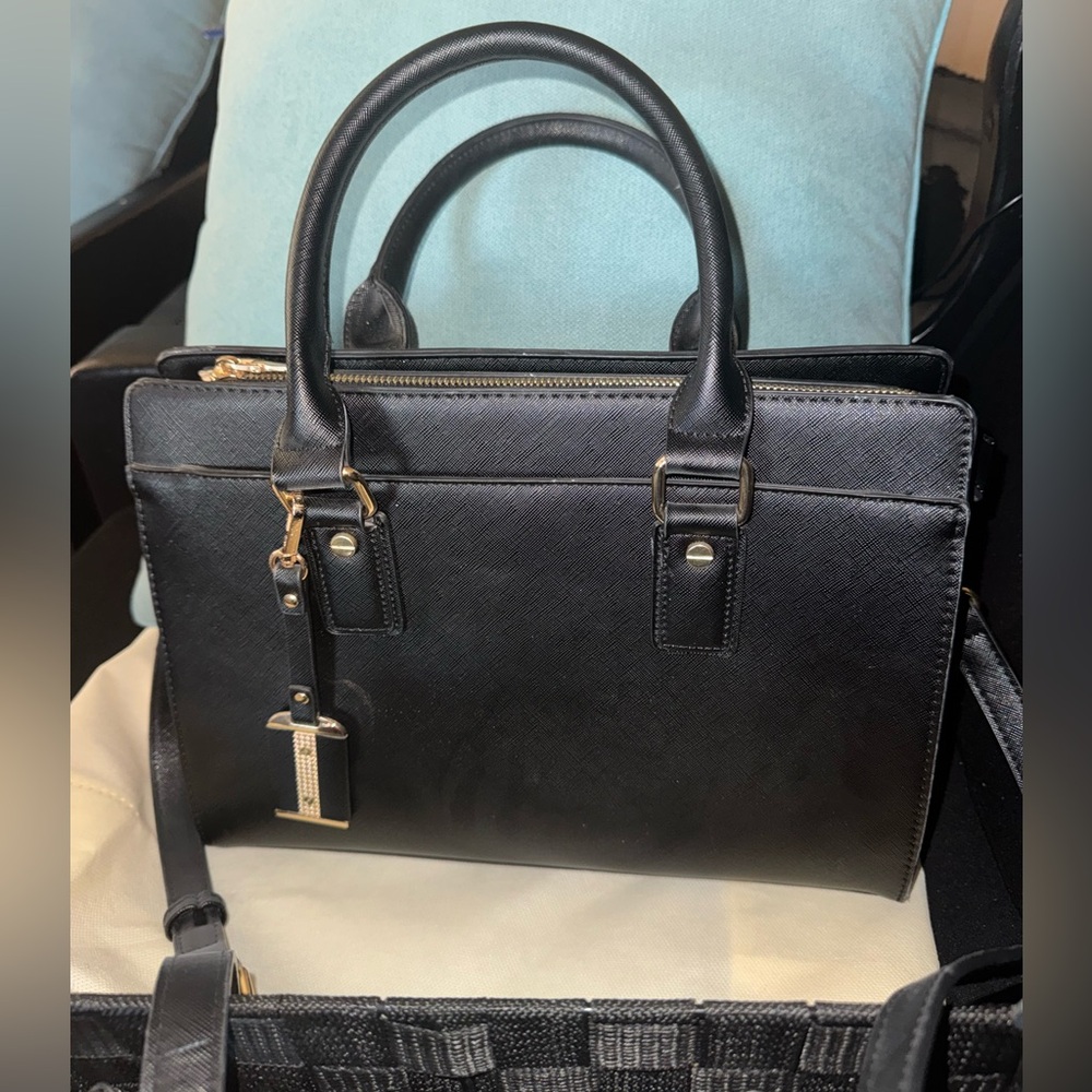 Elegant Black Handbag with Gold Accents